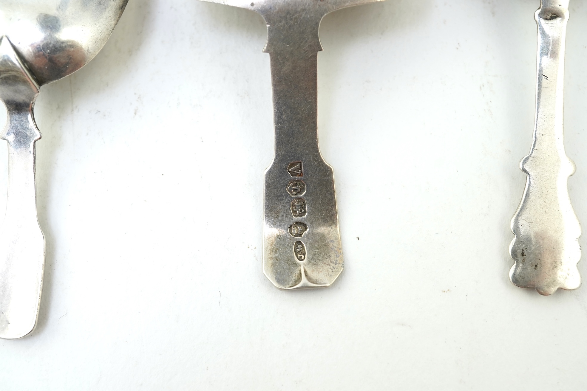 Ten assorted manly 19th century silver caddy spoons